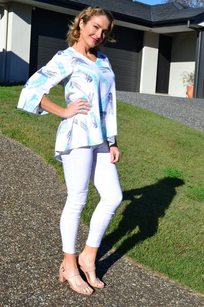 Ocean-colored linen cotton tunic top by Ruby Rain, featuring a relaxed fit with flowing fabric and casual style.