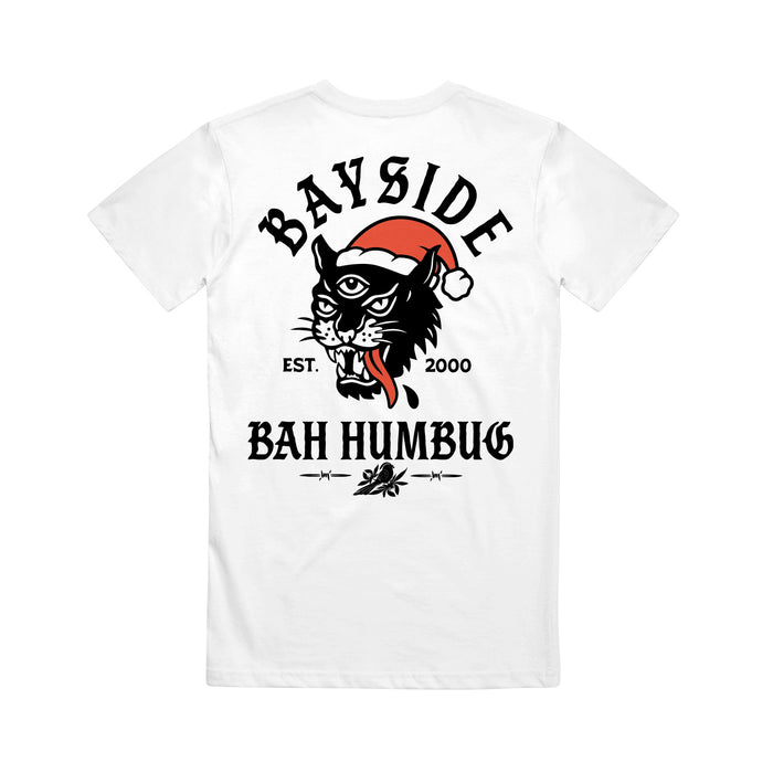 White Bayside T-shirt featuring a black panther in a Santa hat, "BAYSIDE" above, "BAH HUMBUG" below, EST. 2000 on each side, and decorative lines underneath.