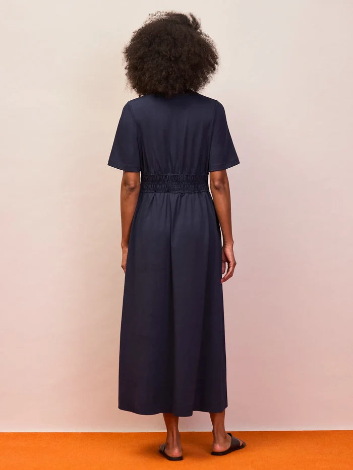 Minimalist navy midi dress with gathered elastic waist and soft drape