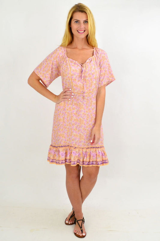 Baby pink floral tunic top from New U Collection, featuring a flowy summer design with a relaxed fit and feminine pattern.
