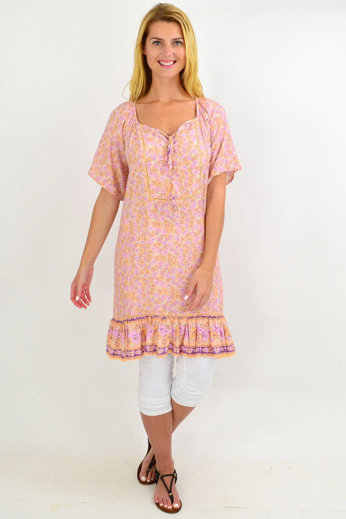 Baby pink floral tunic top from New U Collection featuring a flowy summer design and lightweight fabric.