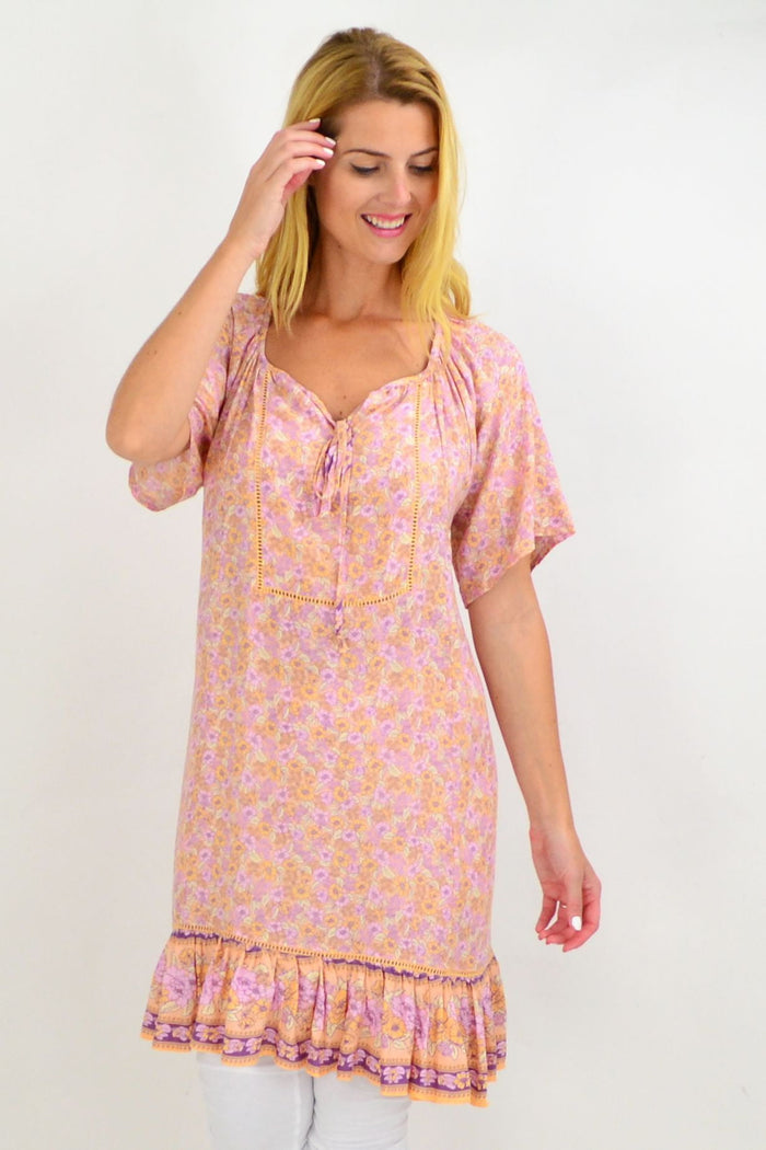 Baby pink floral tunic top from New U Collection, featuring a flowy design and summer style, perfect for casual wear.