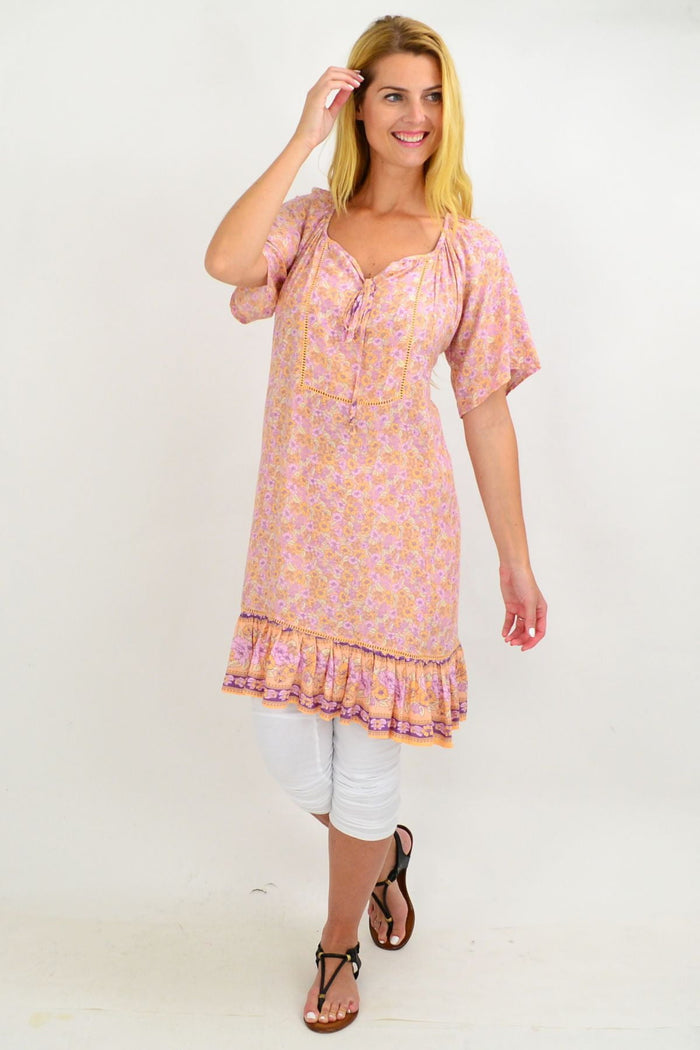 Baby pink floral tunic top from New U Collection, flowy summer women’s blouse with a relaxed, feminine fit.