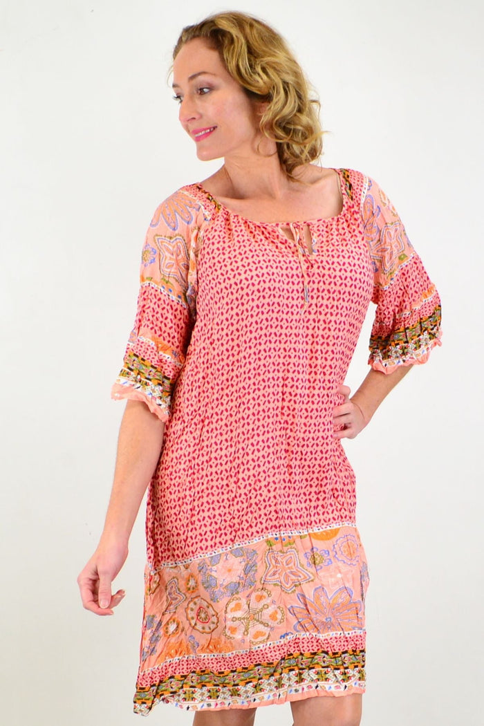 Pink Star Fish Crinkle Tunic Dress by Hourglass, featuring a flowy tunic with starfish pattern and crinkle fabric detail.