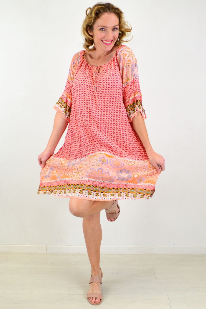 Pink starfish crinkle tunic dress by Hourglass, featuring a relaxed fit and textured fabric, styled for casual wear.