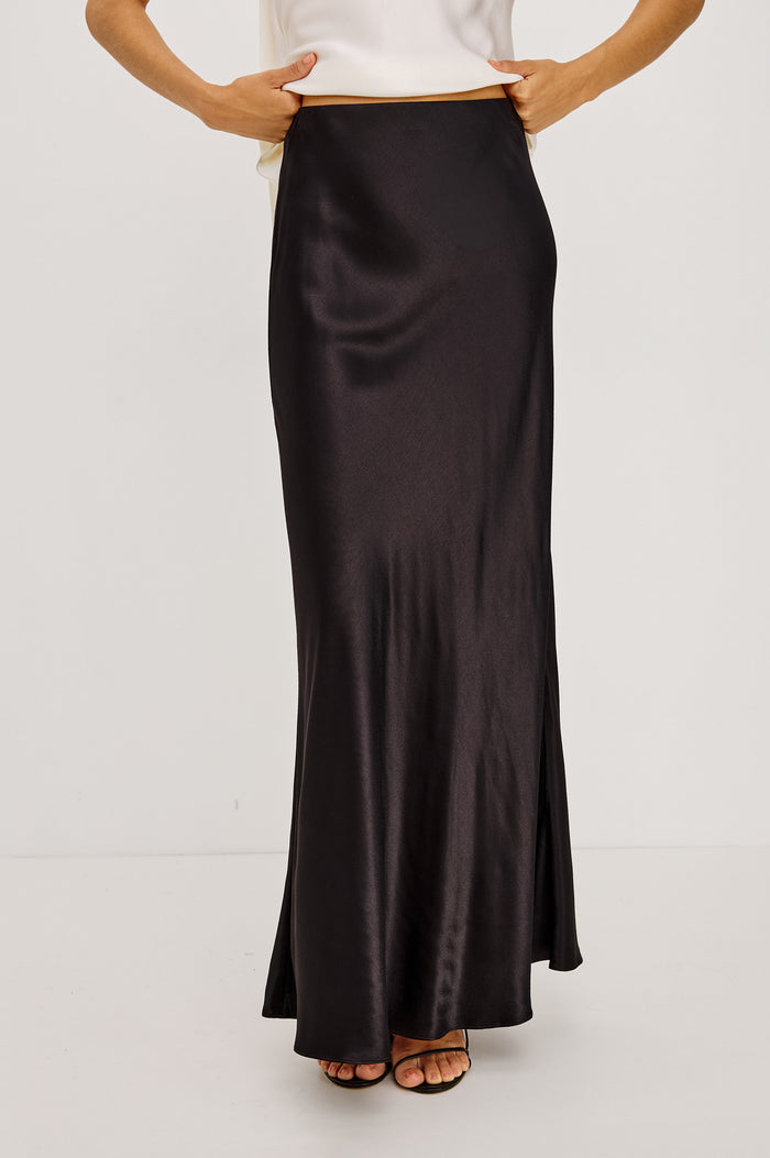 Romina Midi Skirt in Satin Back Crepe With Bias Cut in Ginger Spotted Colorway - Lower Body Front View Featured on Model