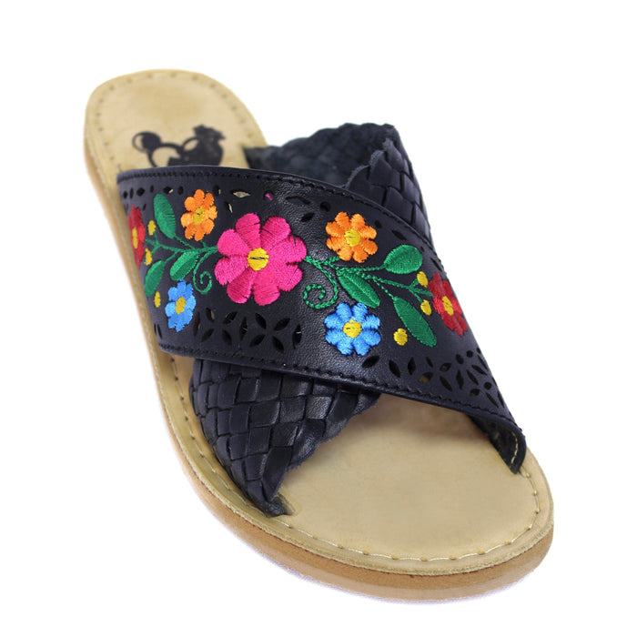 Black leather crossed sandals with colorful floral embroidery
