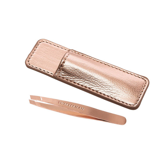 Rose Gold Mini Slant & Case | Tweezerman showing sleek rose gold slant tweezers paired with a matching textured protective case, ideal for precise grooming and skincare routines.