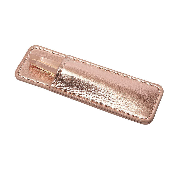 Rose Gold Mini Slant & Case | Tweezerman featuring a rose gold slant tweezer partially inserted in a matching textured leather case.