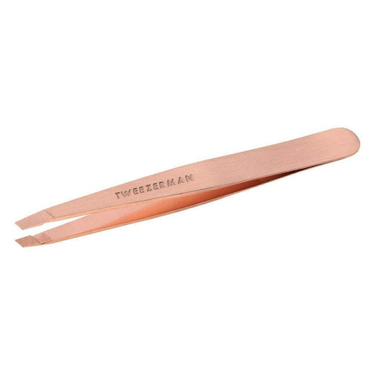 Rose Gold Slant Tweezer | Tweezerman with precision angled tip and engraved brand name, designed for flawless eyebrow shaping and skincare grooming.