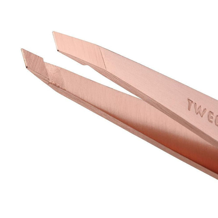 Close-up of the precision tip of the Rose Gold Slant Tweezer | Tweezerman, designed for accurate and gentle hair removal with a sleek rose gold finish.
