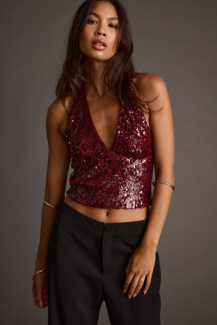 Detail shot of the Selena Mulberry Sequin Halter Top highlighting the halter elements.
