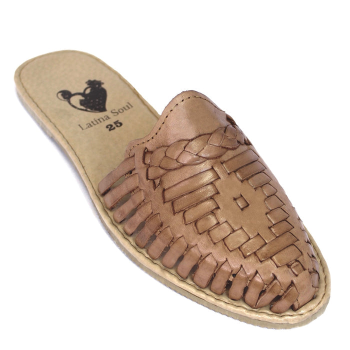 Women's handmade genuine leather huarache mule sandals featuring a traditional woven leather upper, backless slip-on design, cushioned leather footbed, flexible rubber outsole, and authentic Mexican artisan craftsmanship.