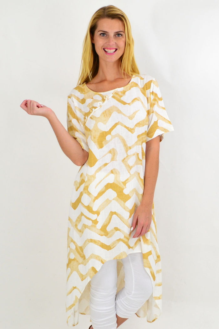 Beige tribal print linen mix hi-low hem tunic by Ruby Rain, featuring a relaxed fit and casual boho style.