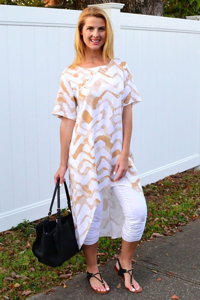Beige and cream tribal print linen blend hi-low hem tunic by Ruby Rain, showcasing a flowy, casual boho-style top.
