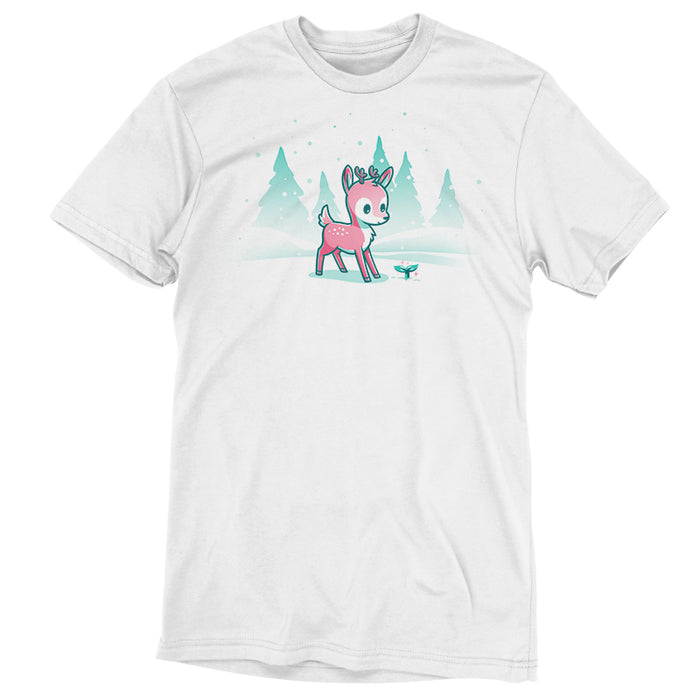 Premium Cotton T-shirt_TeeTurtle white Winter Wonderland apparel featuring a cartoon deer with small antlers stands in a snowy landscape with evergreen trees, looking curiously at a glowing sprout on the ground. Snowflakes are falling around them.